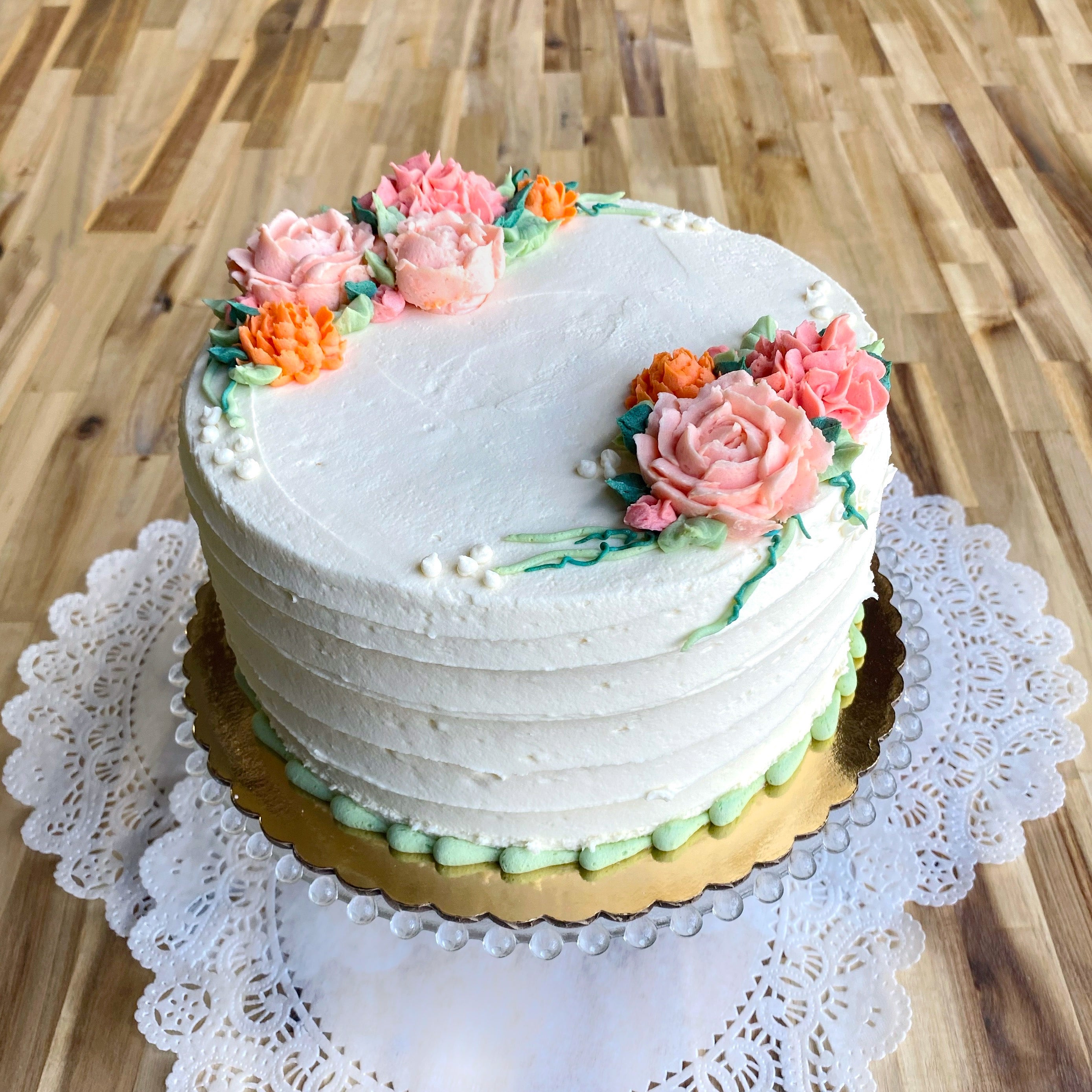 Baker Street - Online Courses - Piped buttercream flowers on a naked cake.  What more can you wish for? 🤩 Come and learn how to make this beautiful floral  cake on Friday